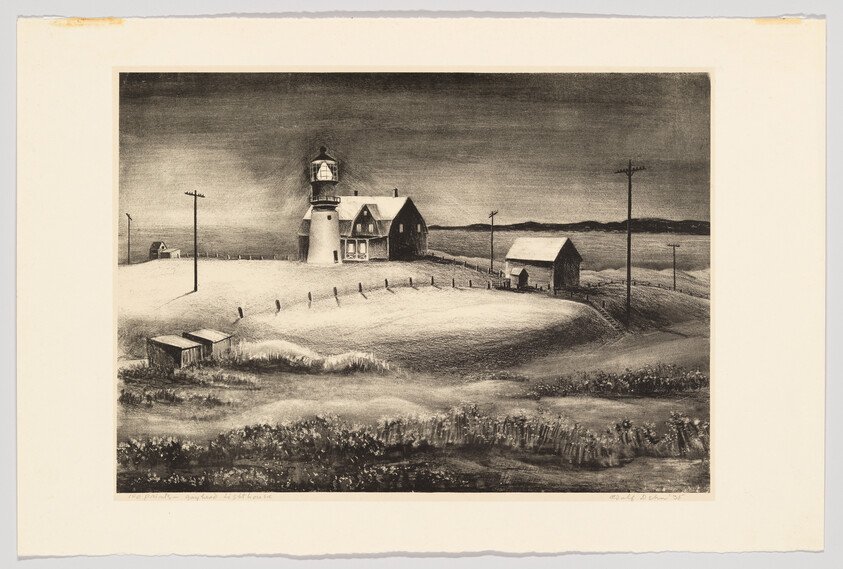 A lighthouse and attached keeper's house stand on a grassy coastal hill overlooking fields and sea.