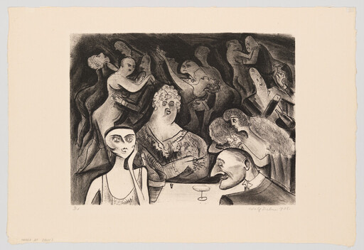 A young woman and others sit at a table while dancers swirl behind them.