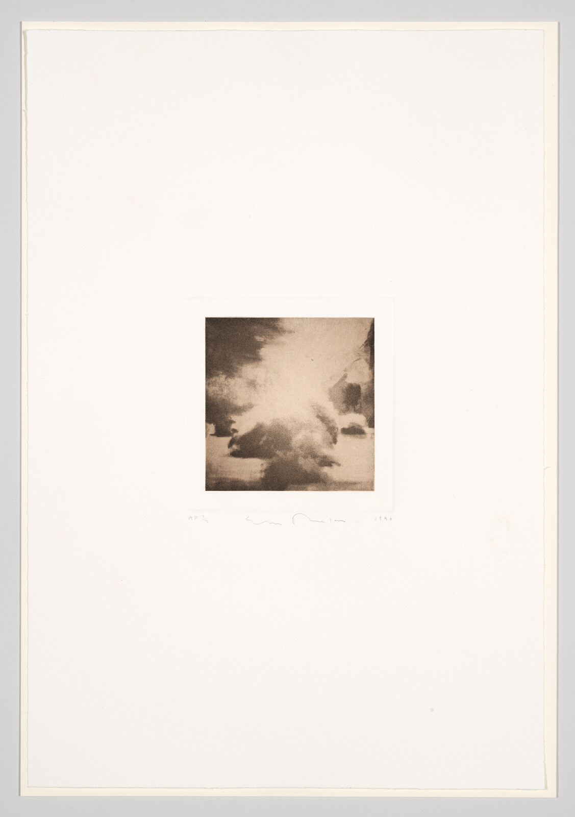 A sepia-toned photograph of clouds in the sky, centered within a large white border. Handwritten text and numbers are visible at the bottom of the border, suggesting an artist's signature or edition number.