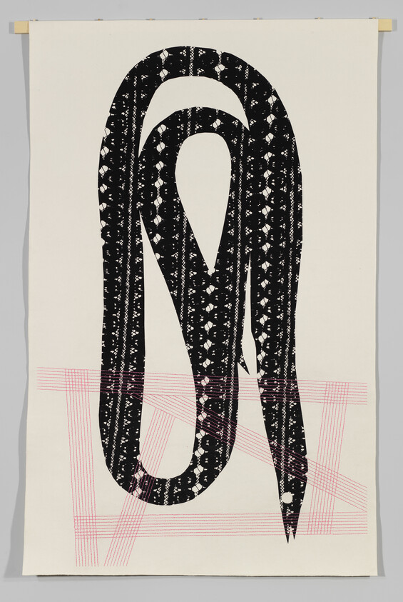 Large black patterned ribbon loops over red grid lines on a cream hanging textile.