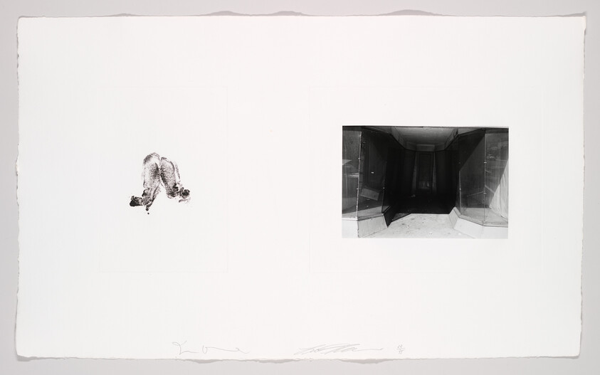 Small black ink impression and a dark recessed storefront photograph placed on a large white sheet.