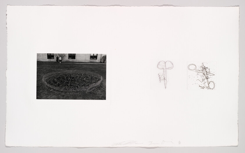 A circular wire sculpture sits on grass with two people by a building and two sketches beside it.