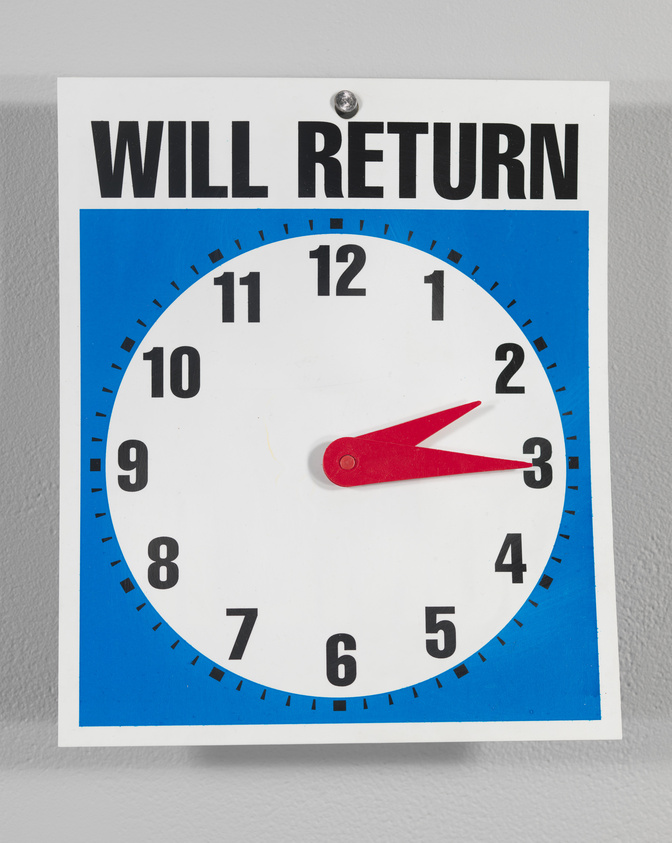An analog clock set to two o'clock with WILL RETURN written above in capital letters