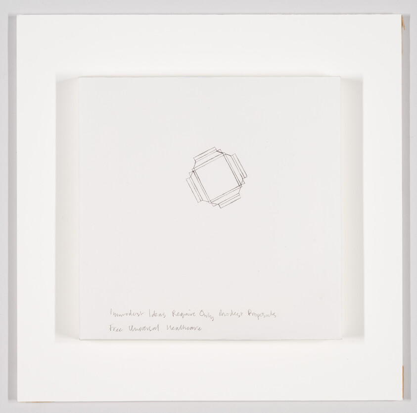 Framed white artwork showing a small geometric line drawing in the center and faint handwritten notes below.