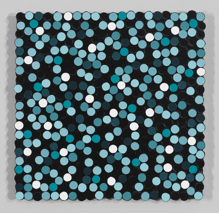 Square panel covered with many evenly spaced teal, light blue, and white circular disks on black.