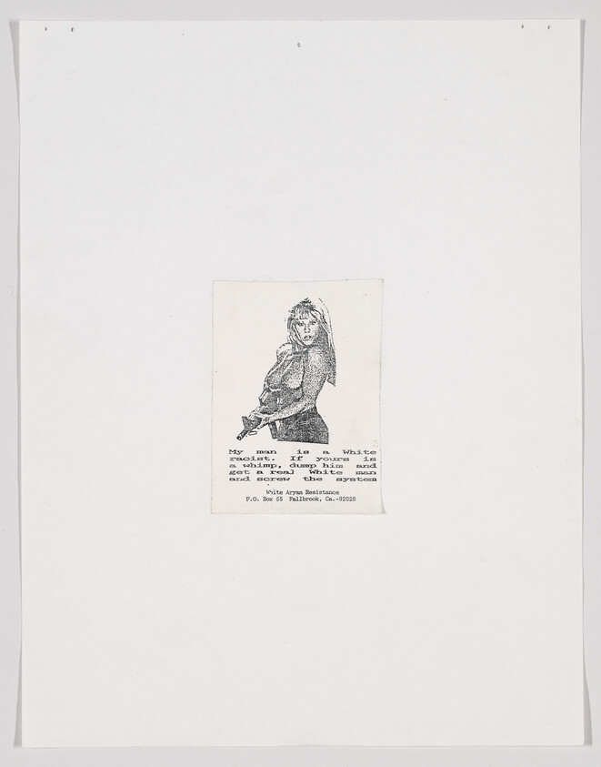 Small printed card centered on white paper showing a sketched woman and a typed paragraph below.