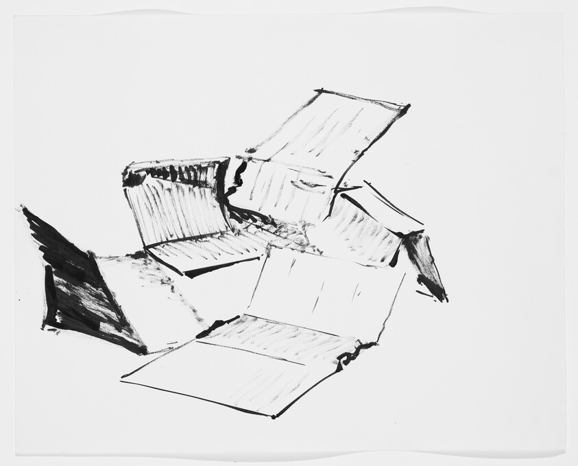 Several open and flattened cardboard boxes arranged loosely on a white surface.