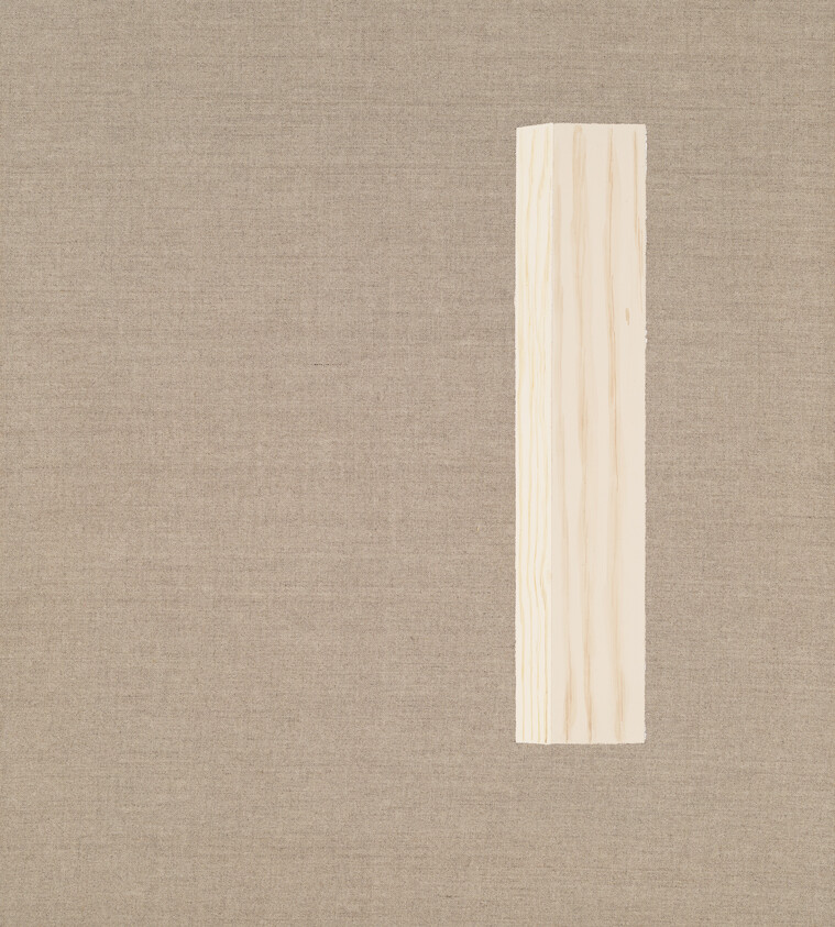A pale vertical wooden plank rests on a beige woven fabric background.