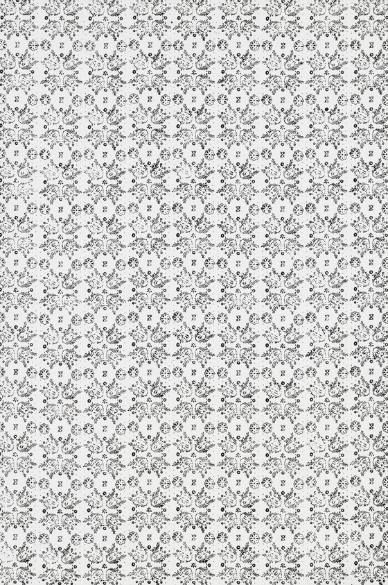 A densely patterned image with a repetitive design consisting of small, intricate details in black and white, creating a wallpaper-like effect.