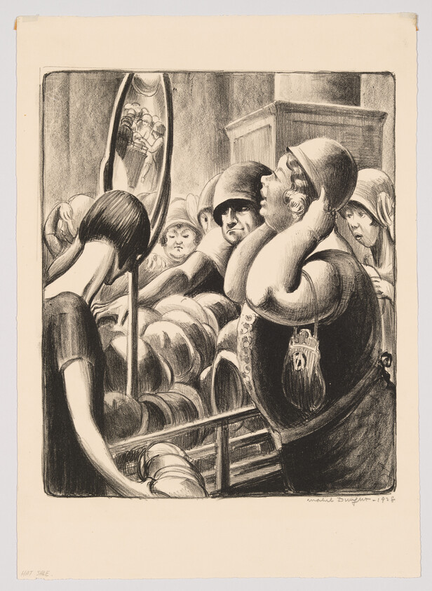 Women crowded at a hat shop trying on cloche hats while examining themselves in a mirror.