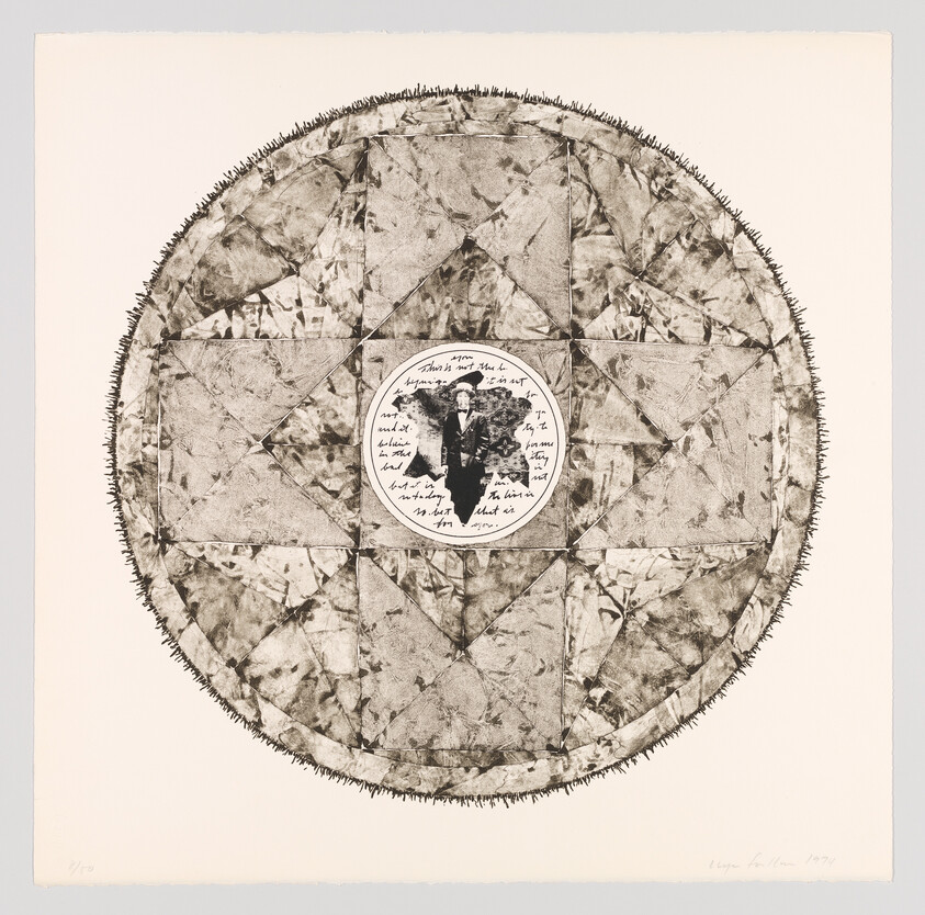 Large circular patterned print with a small central photograph of a man in a suit and handwriting.