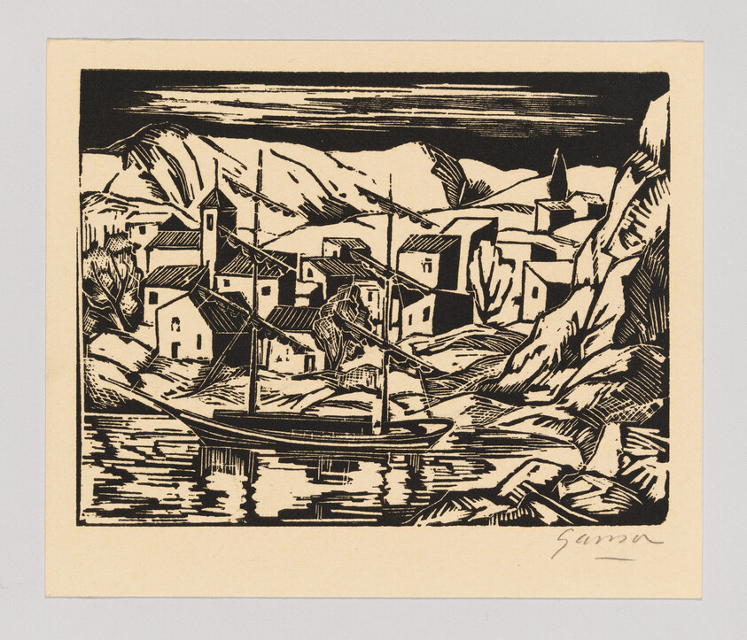 A small sailboat rests in calm water before a coastal village with houses and hills.