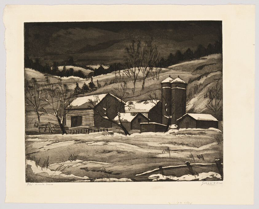 Snow-covered farm with barns and two silos set among rolling hills under a dark sky.