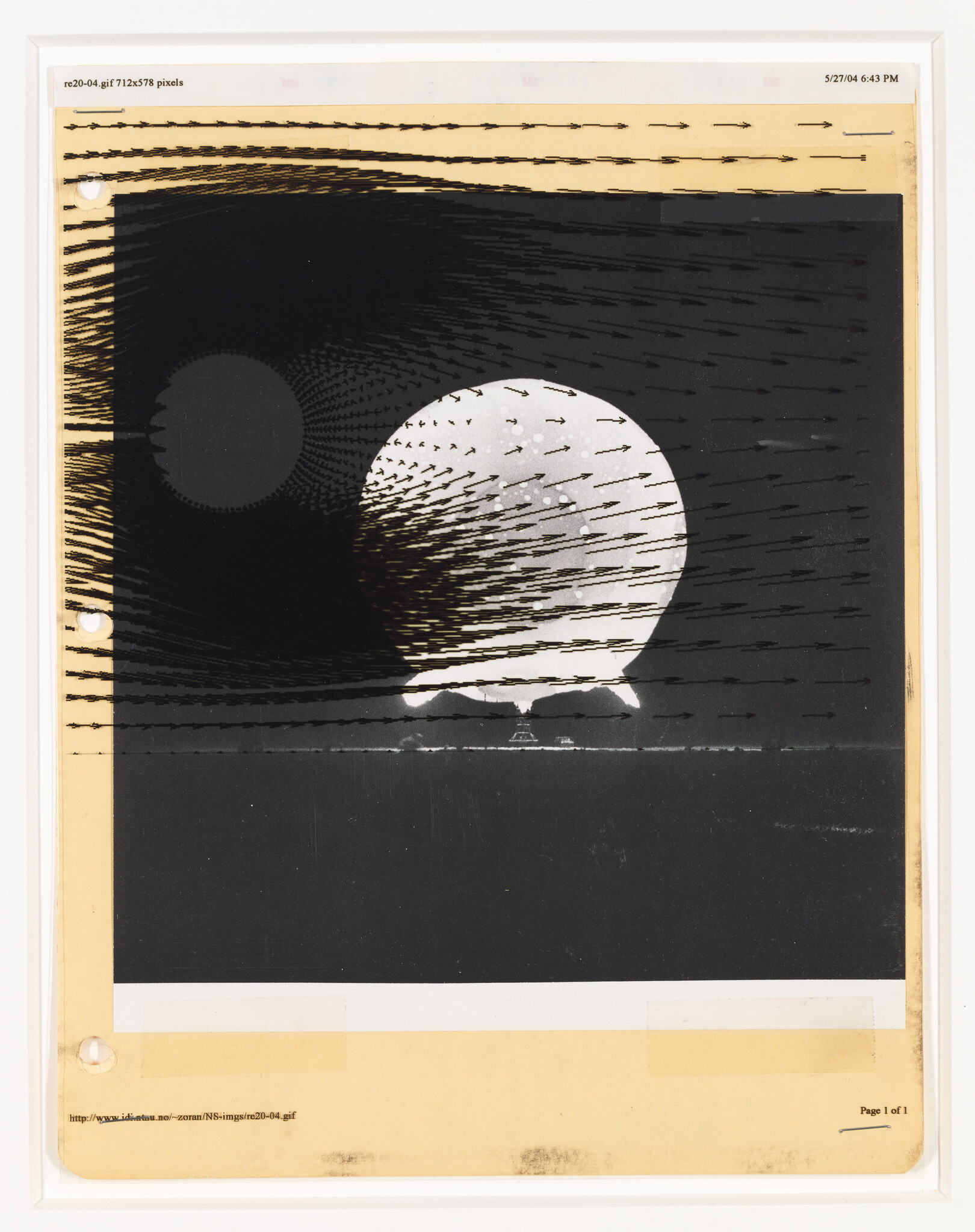 Large white sphere with arrows showing flow patterns against a dark background on printed sheet.