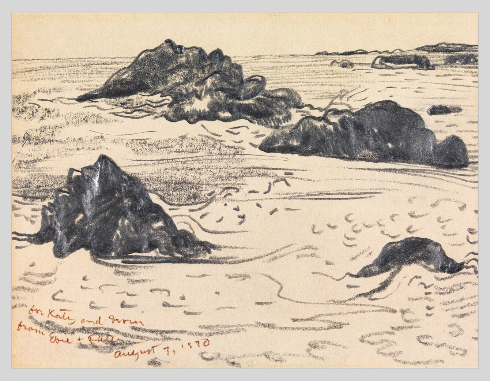 Dark charcoal rocks scattered in shallow water with gentle ripples across the sandy shore.