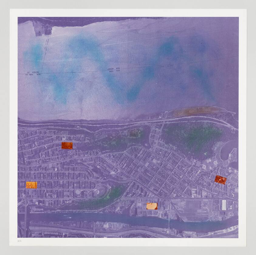 Aerial map of a coastal town with four orange highlighted areas marking points of interest.