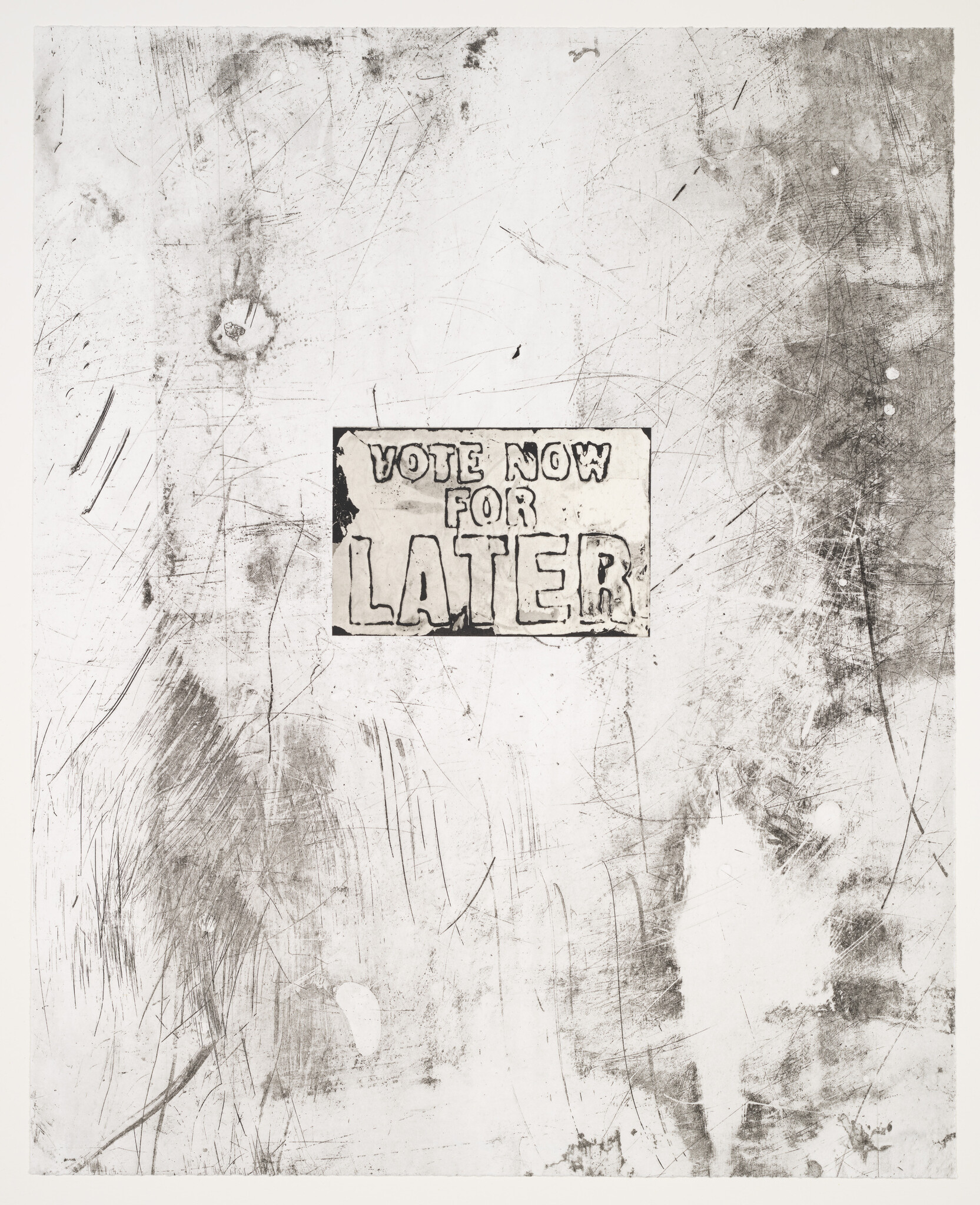 At the center of a scratched, white surface, a white sticker reads, in outlined block letters, Vote Now for Later.