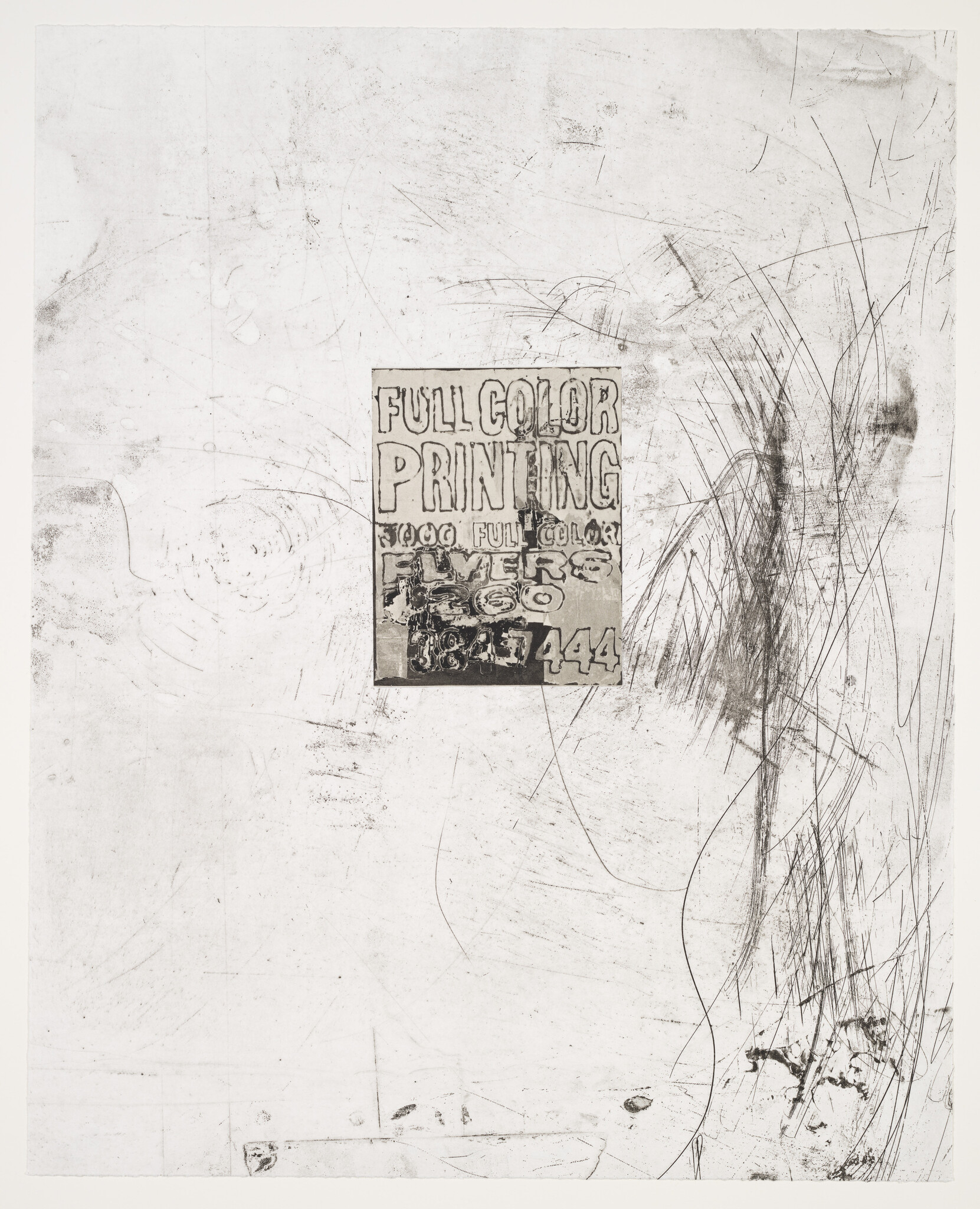 Small worn poster advertising full-color printing and flyers stuck to a large scratched white wall.