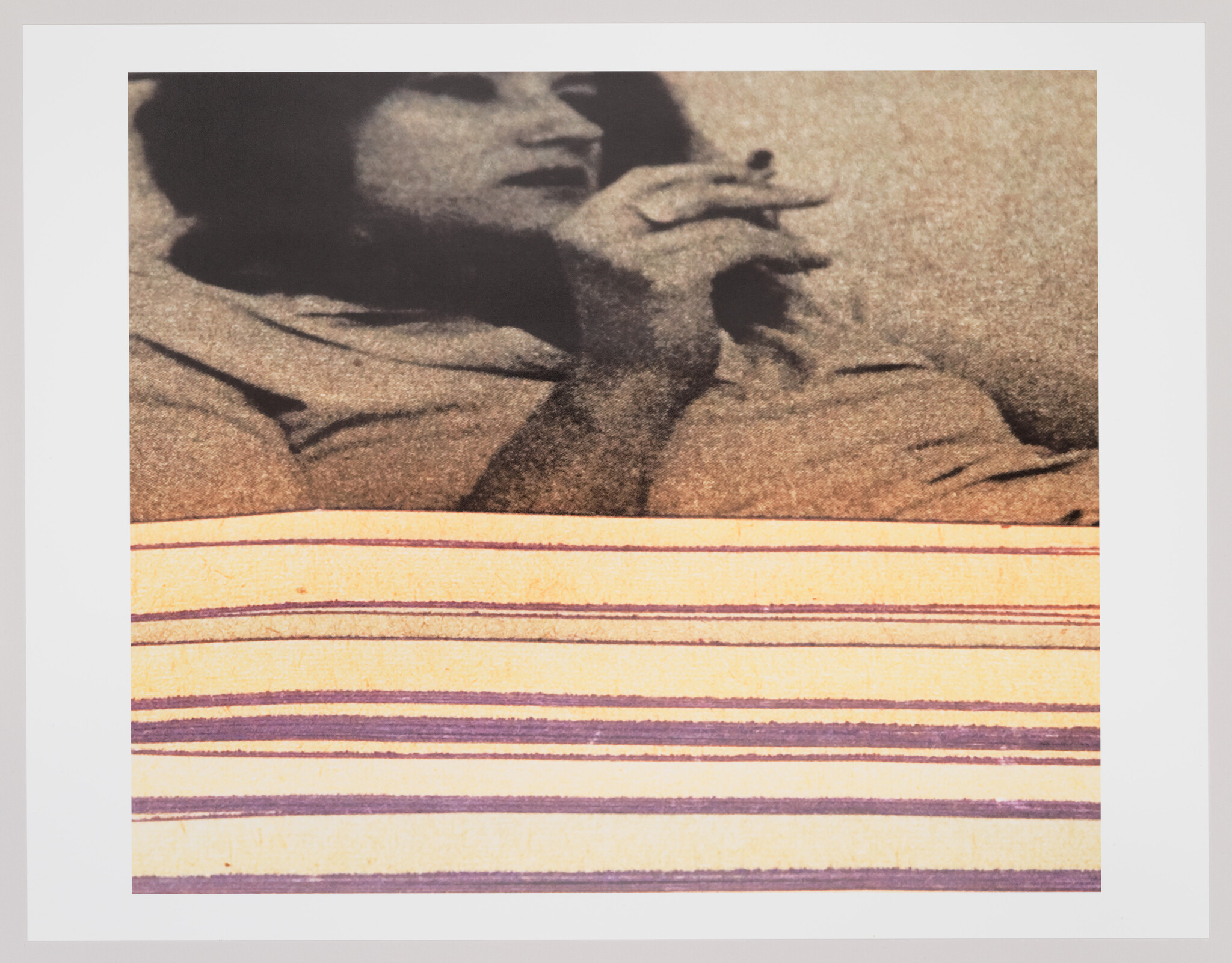 Woman reclining and holding a cigarette above a striped blanket in a grainy print.