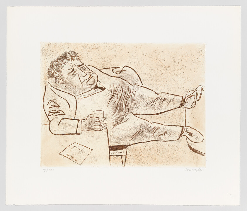 A heavyset man slumps across a chair, holding a drink and looking tired.