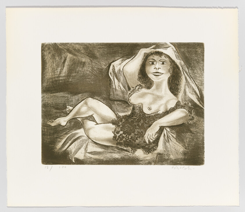 A reclining woman in lace lingerie lifts a veil while posing on a draped couch.