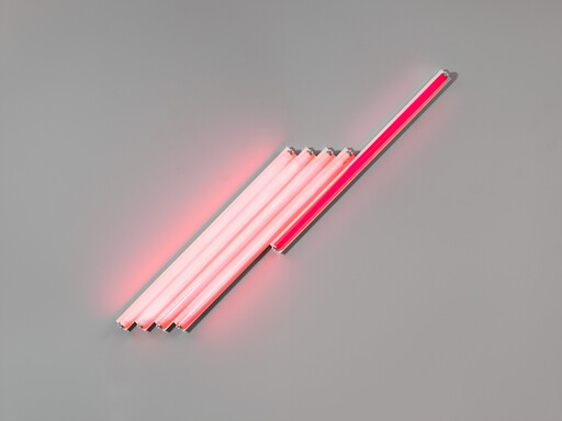 Five short pink fluorescent tubes and one long pink tube mounted diagonally on a gray wall.