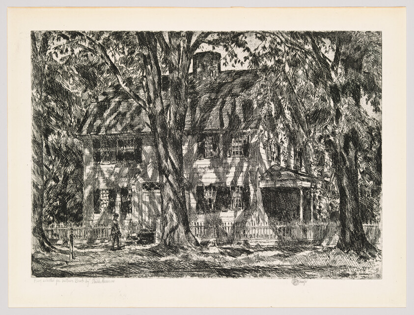 A two-story house partly hidden by large trees casting dappled shadows across the front yard.