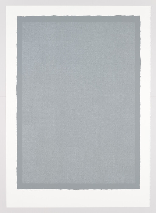 A minimalist artwork featuring a large, centered grey rectangle with a textured appearance, surrounded by a white border with rough, uneven edges.