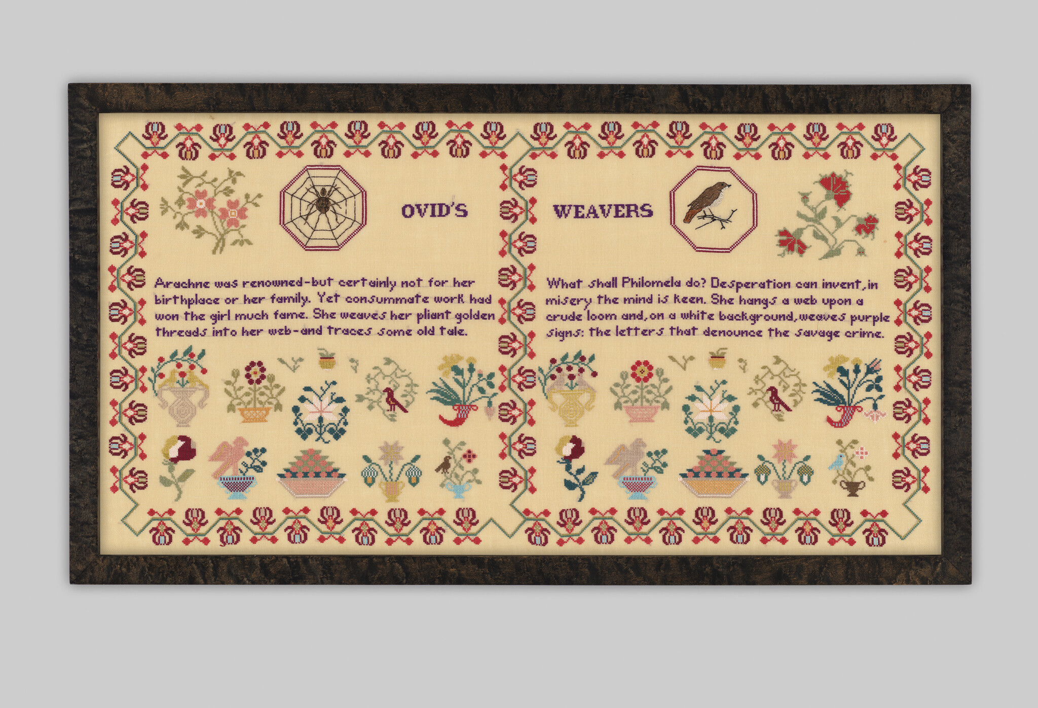 Framed embroidered sampler titled "Ovid's Weavers" with floral motifs, spider, bird, and stitched verses.