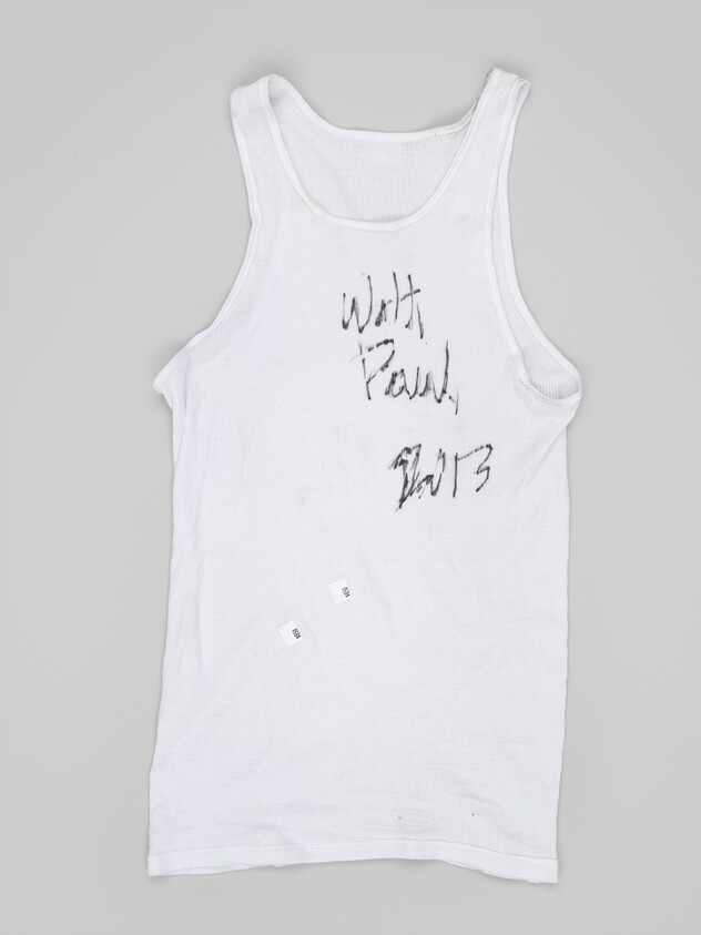 White tank top with black handwritten text 'Walt Paul 2013' on the front.