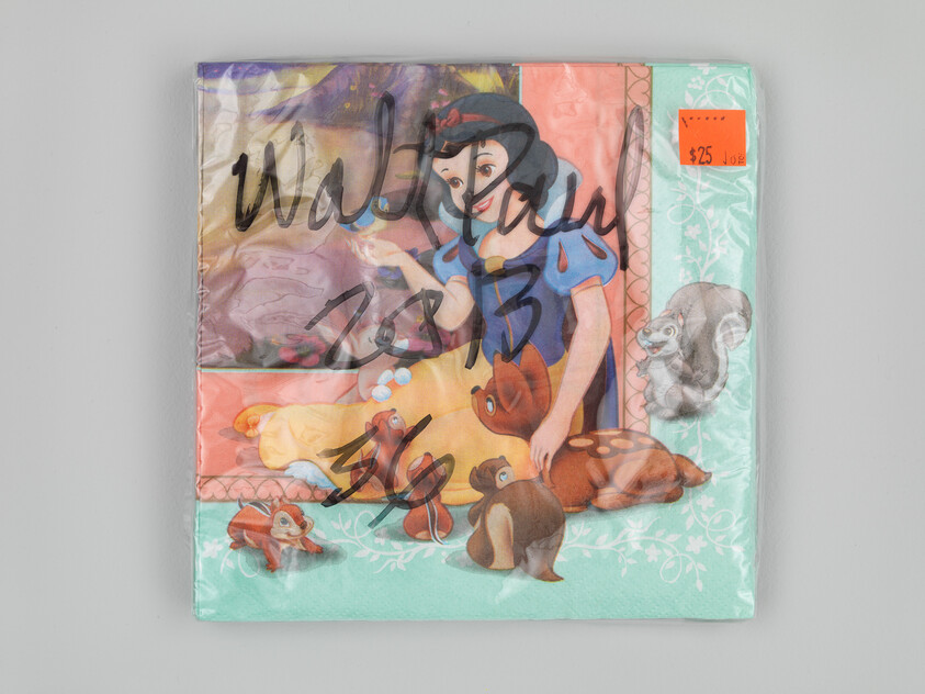 Snow White-themed paper napkins in plastic packaging with handwritten marker scribbles and price sticker.