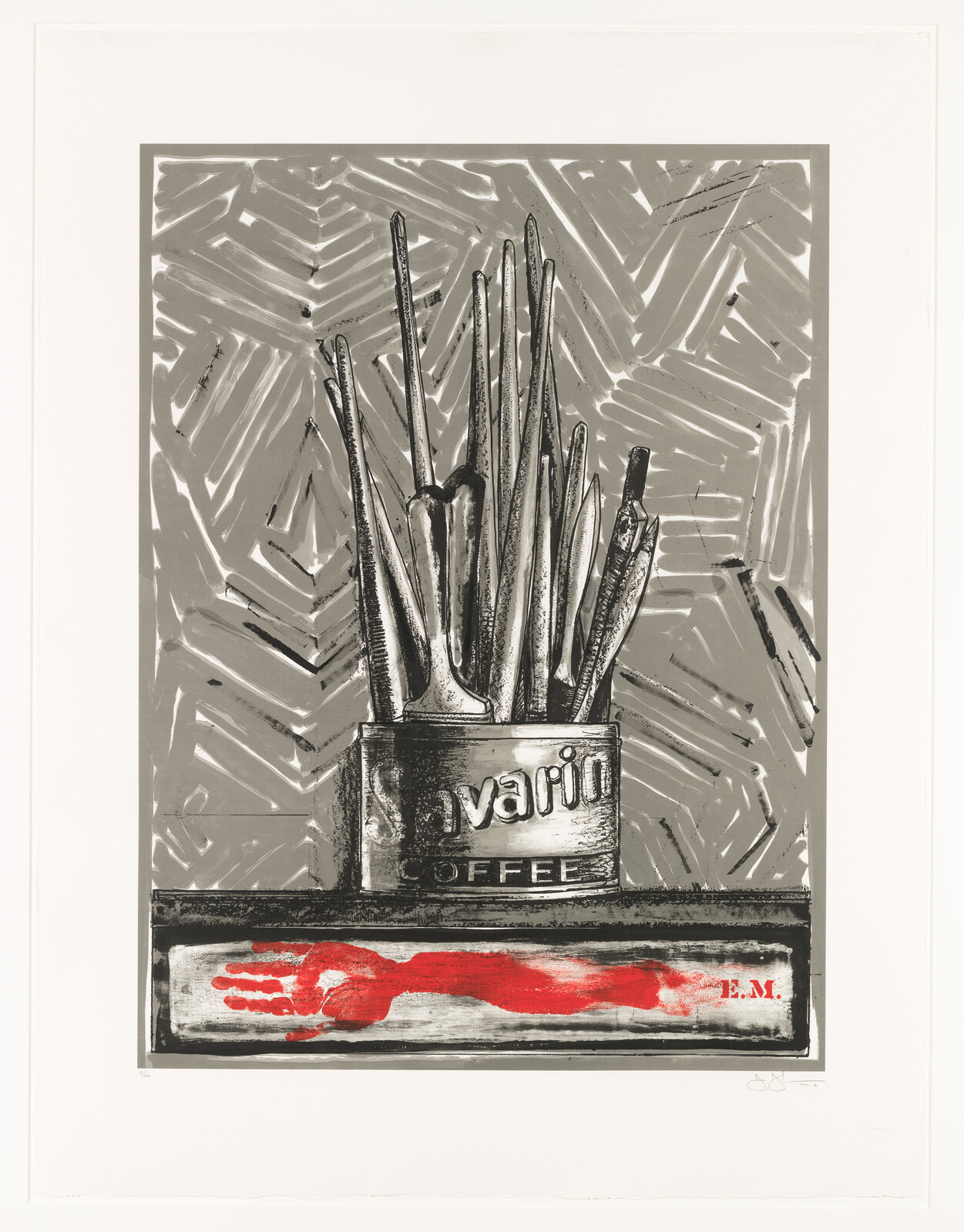 A coffee can filled with brushes and tools sits above a red handprint strip.