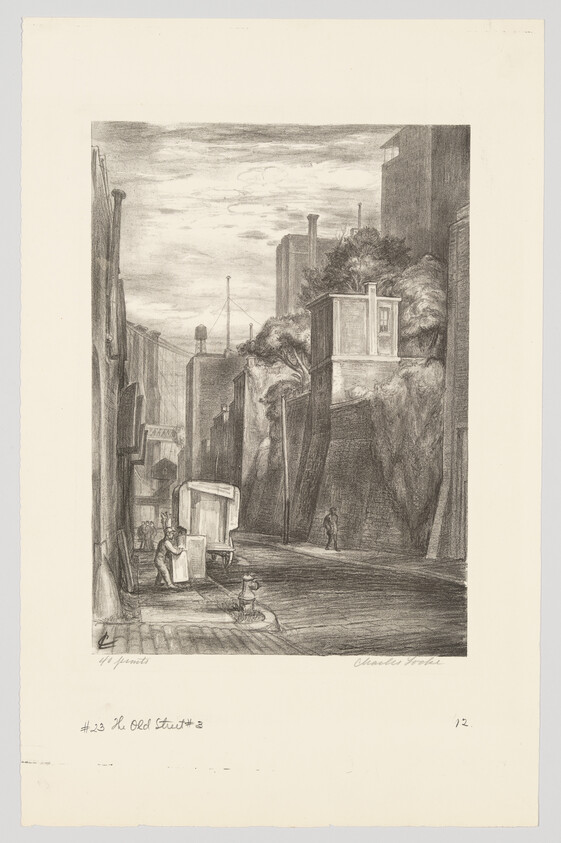 Workers load a cart beside a delivery truck on a narrow urban street with steep retaining walls.