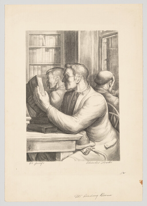 Three men sit in a quiet reading room, one man holding and studying a large book.