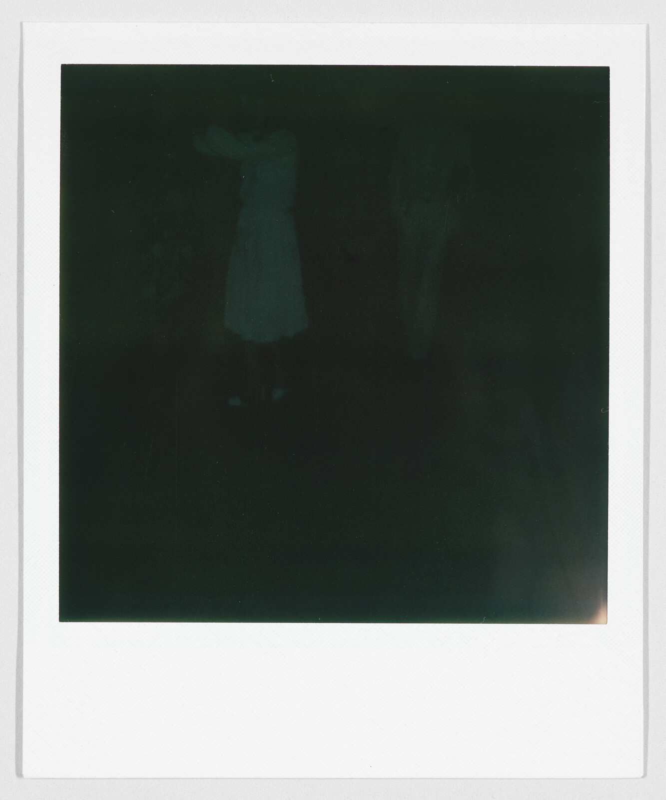 The image is very dark and unclear, making it difficult to see any main subject or action.