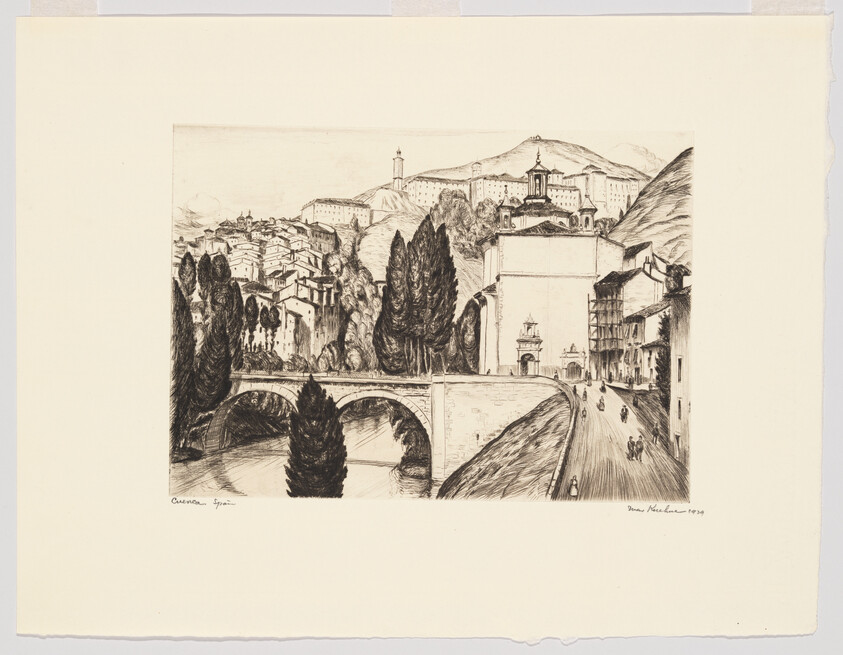 A stone arched bridge crosses a river with a hillside town and pedestrians on the road.