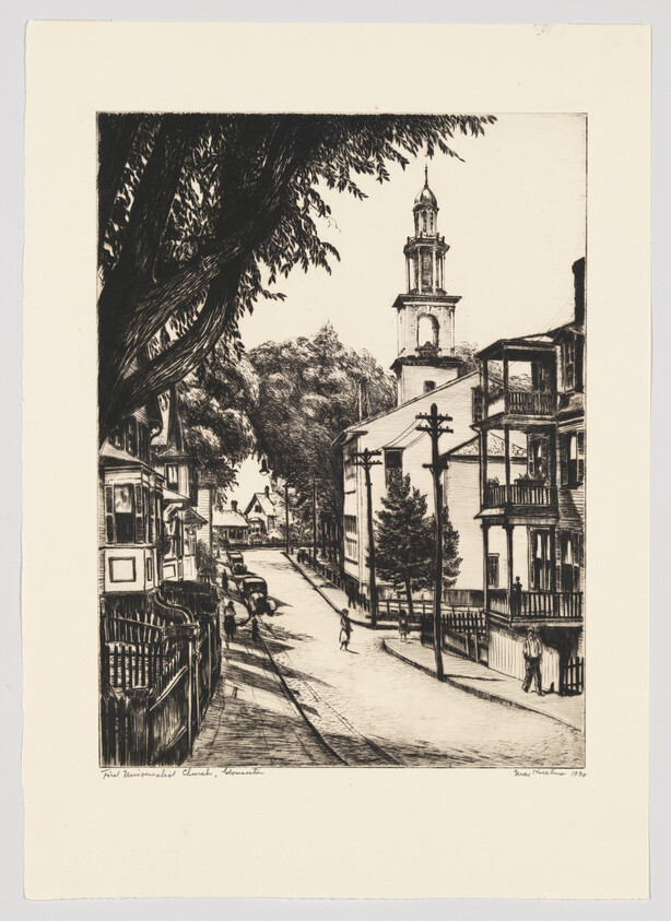 A quiet street with a tall church tower, porches, and a few people walking.
