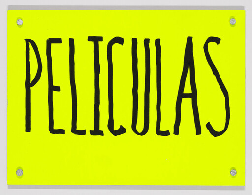 Bright yellow sign reads "PELICULAS" in tall black hand-drawn letters.
