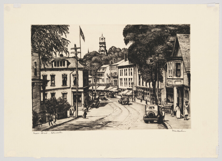 A vintage town main street with cars parked, pedestrians walking, and a clock tower visible.