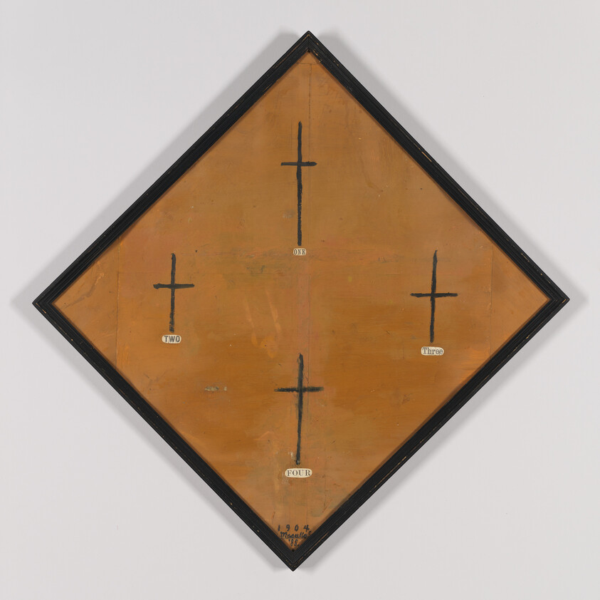 A diamond-shaped framed board shows four black crosses labeled one, two, three, and four.