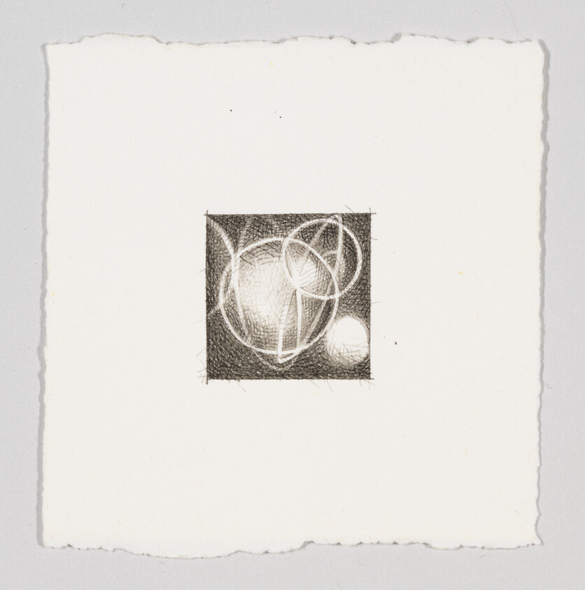 Small pencil sketch shows two overlapping shaded circles inside a dark square on white paper.