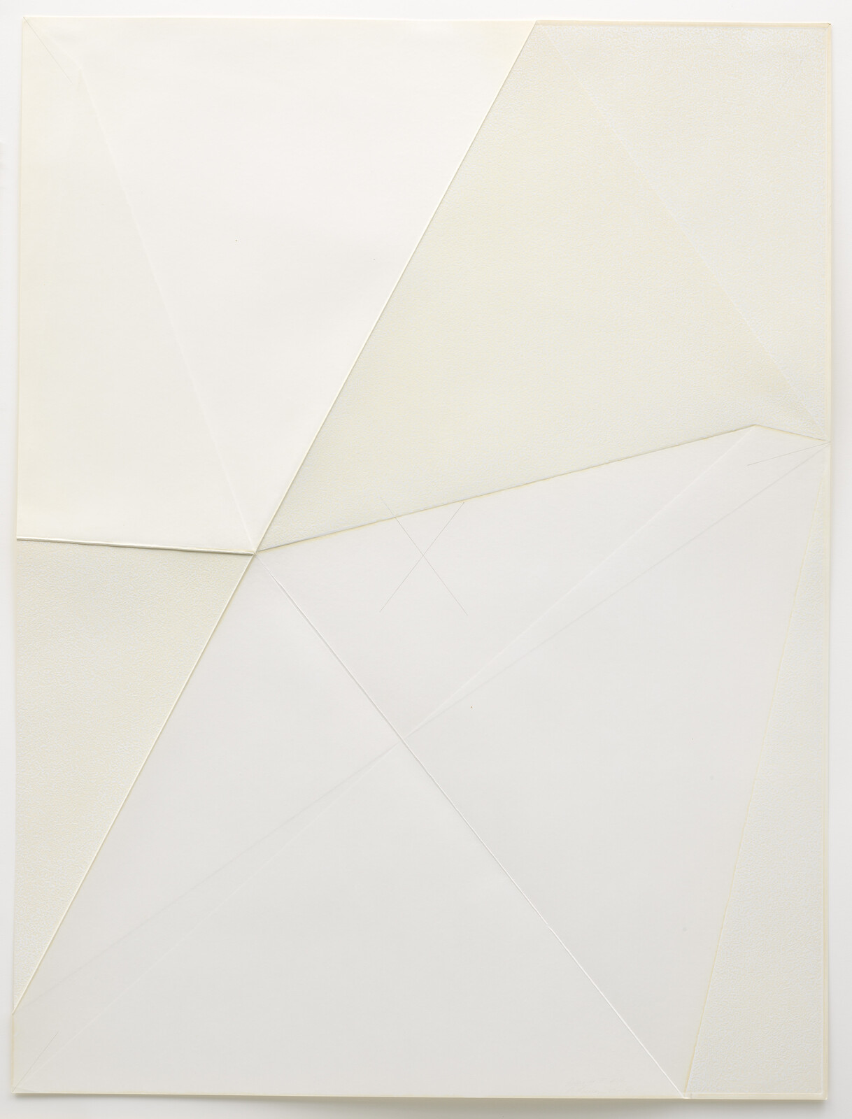White panel with overlapping triangular folds and subtle embossed lines forming geometric shapes.