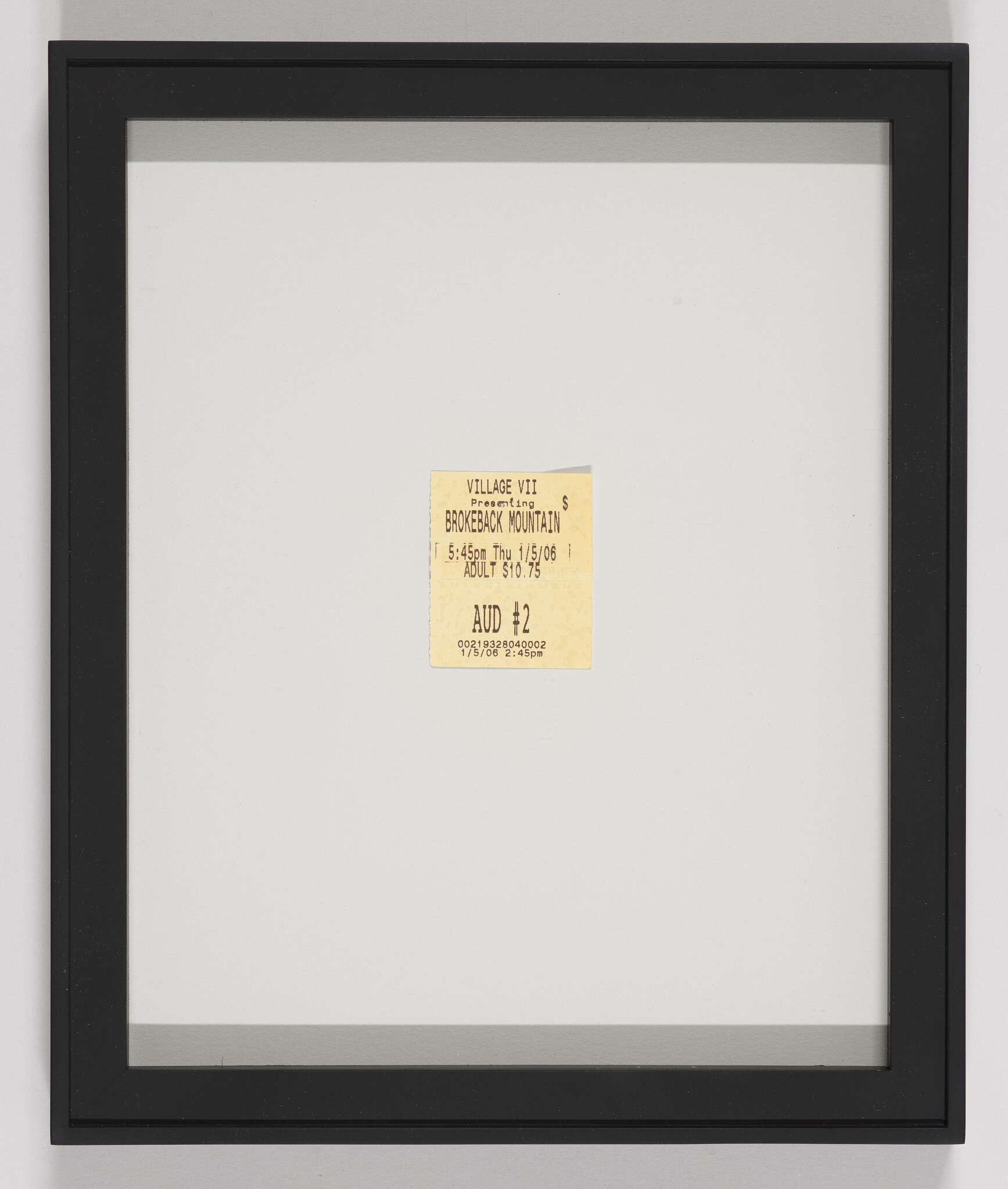 A framed movie ticket stub for "Brokeback Mountain" showing a screening time of 5:45 pm on January 15, 2006, with an adult ticket price of $10.75, displayed against a white background within a black frame.