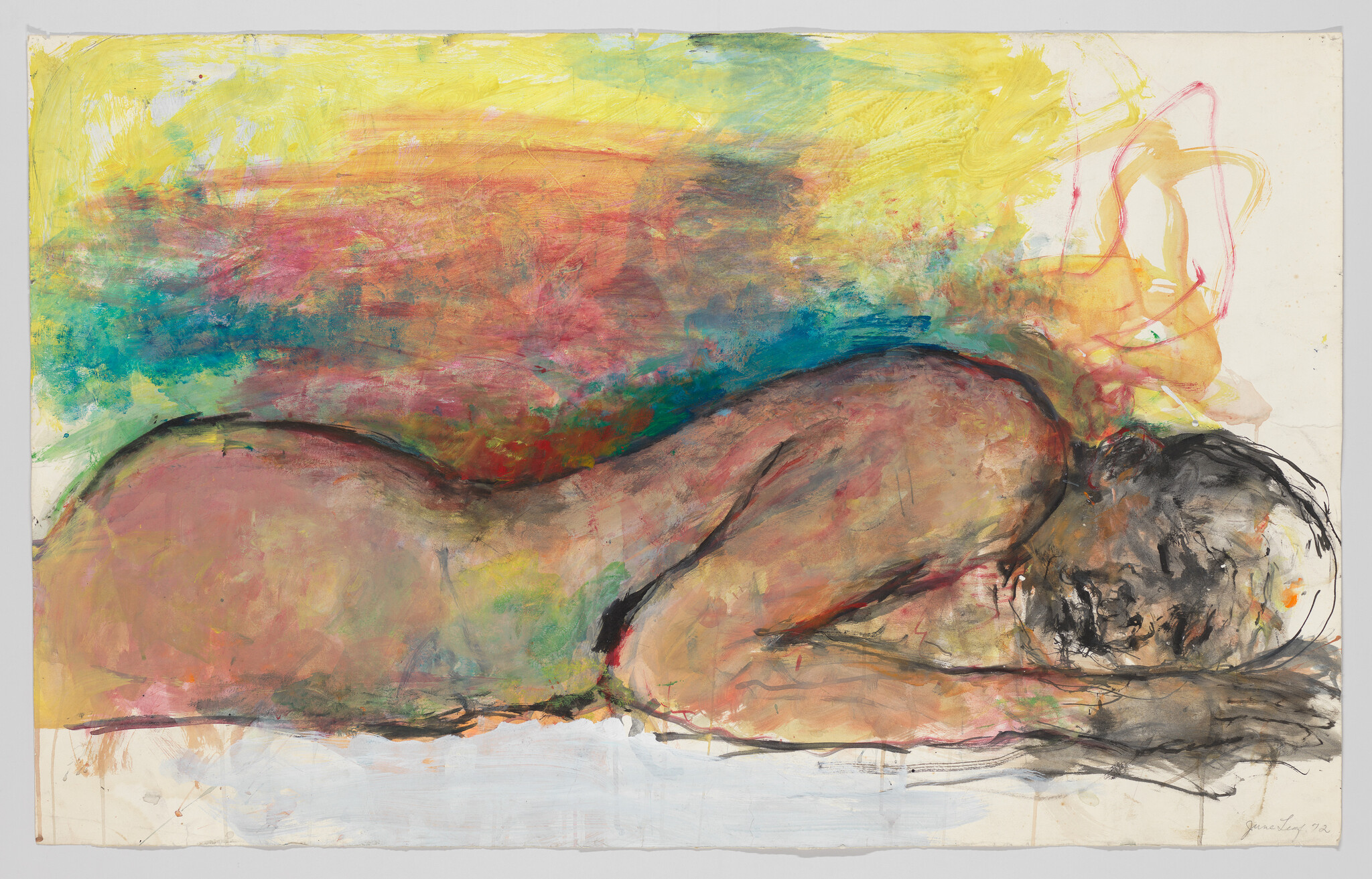 A nude figure lies face down on a bright, multicolored background.