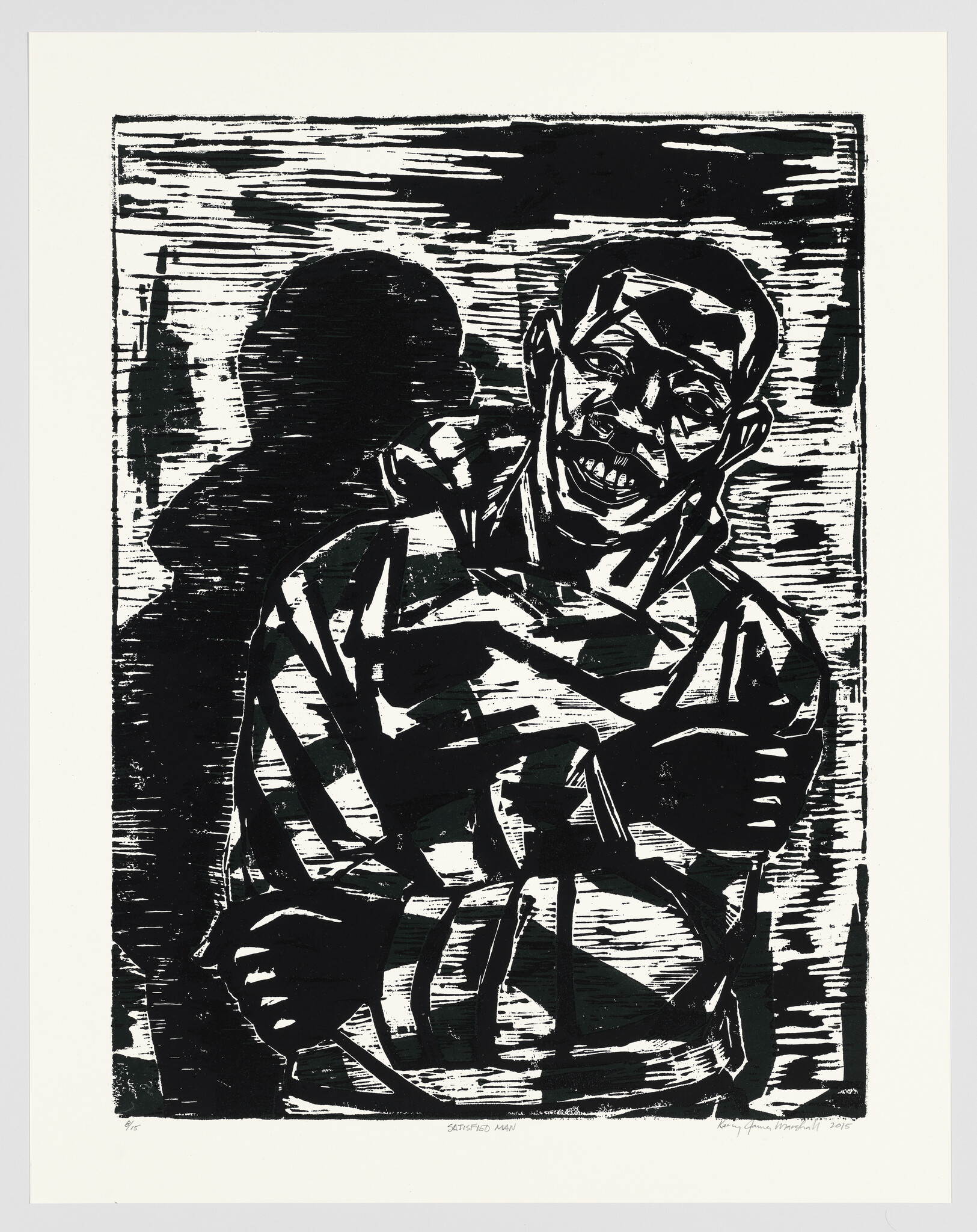 A smiling man in a striped shirt stands with folded arms and a dark shadow behind him.