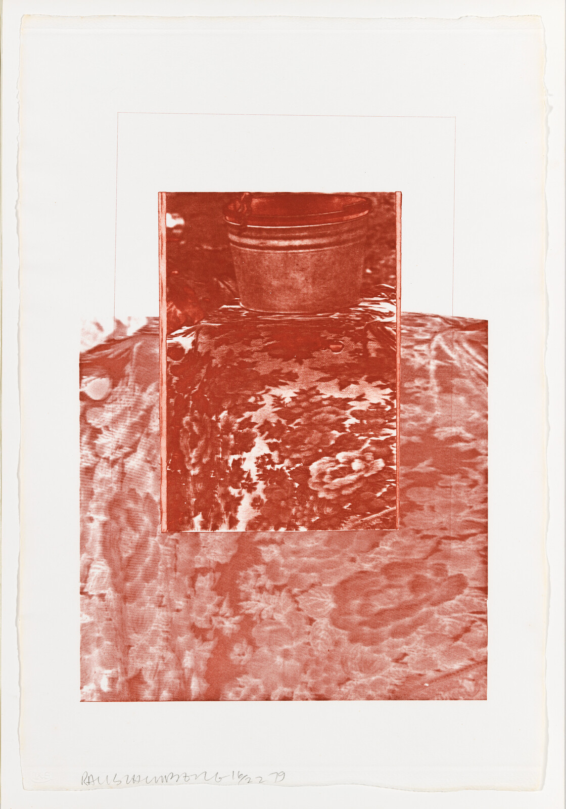 A red-toned print showing a metal bucket resting on a textured, water-like surface.