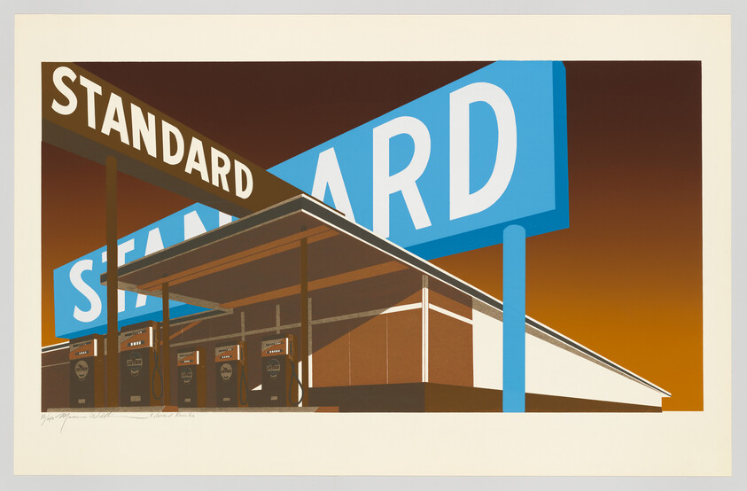 A stylized gas station under large blue signs reading "STANDARD" with orange sunset sky.
