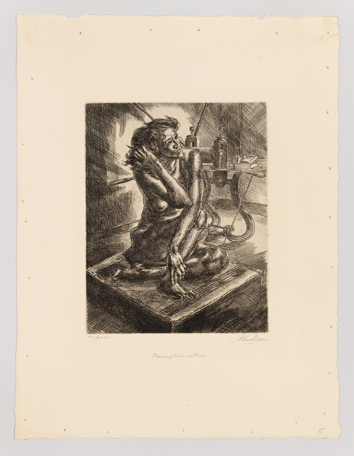 A seated nude woman hugs her knees on a platform while looking up in a cluttered studio.