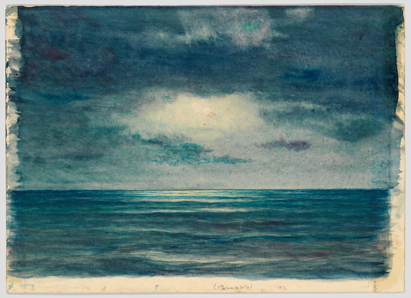 Calm dark ocean under a cloudy sky with a pale light glowing on the horizon.