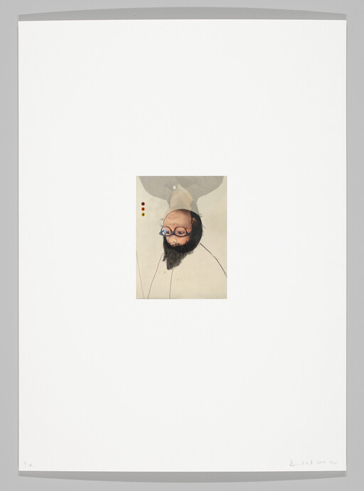 Centered small upside-down portrait of a bespectacled person with a beard on white paper.